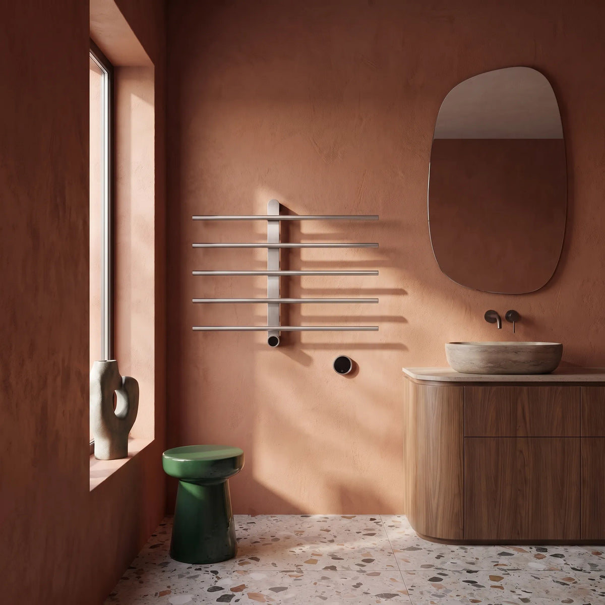 Sèche-serviette Aéraly intégré à une salle de bain rénovée