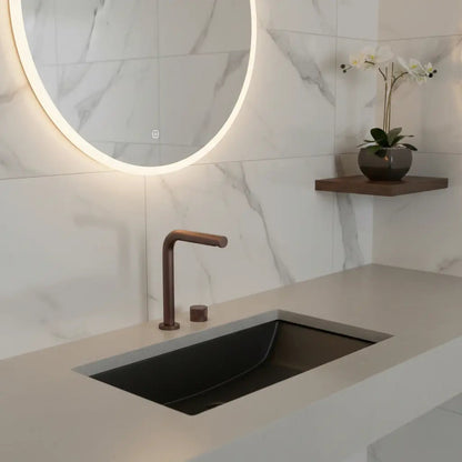 Robinet de lavabo sur plan or rose