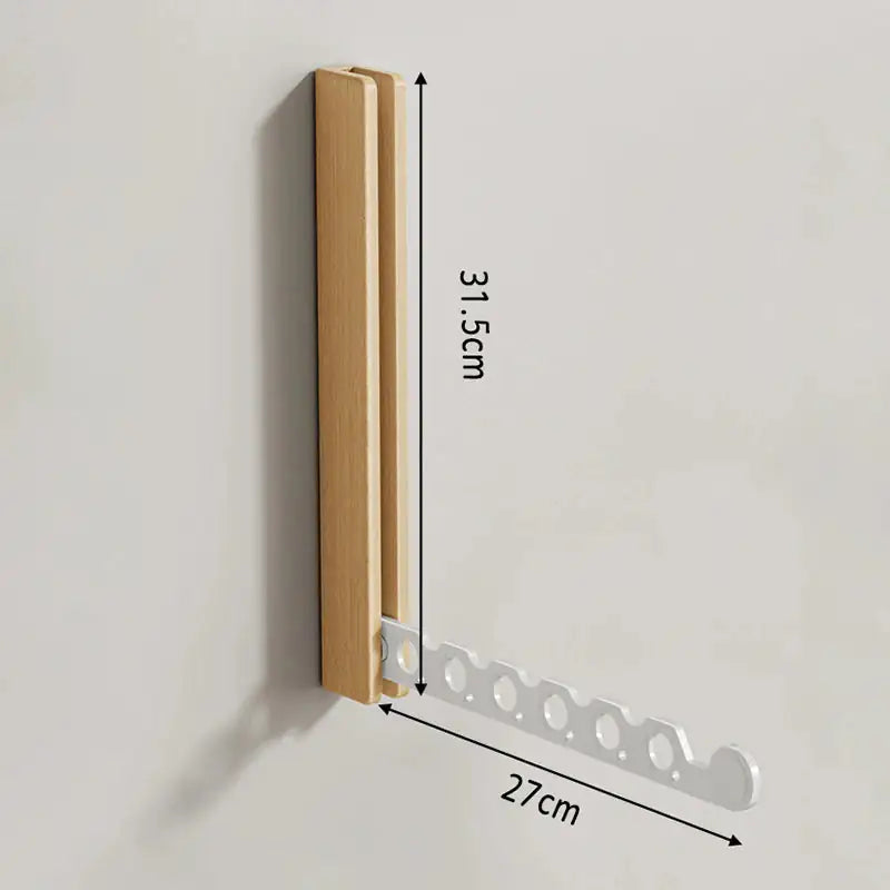 Porte-cintres mural bois pliable – rangement vêtements élégant  aeraly.myshopify.com