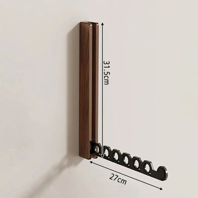 Porte-cintres mural bois pliable – rangement vêtements élégant  aeraly.myshopify.com