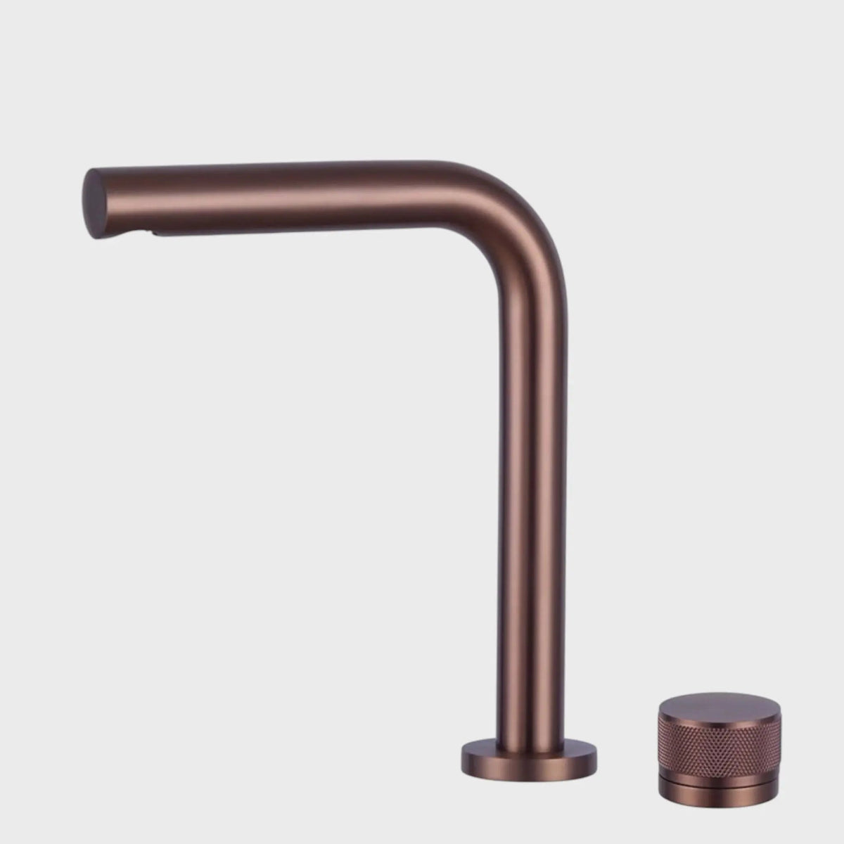 Robinet de lavabo sur plan or rose