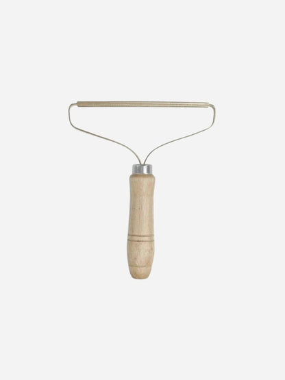 Brosse pour vêtement - Simplifiez le soin de votre garde-robe