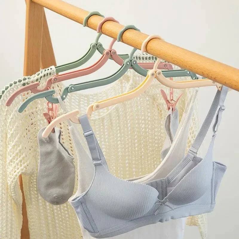 Cintre pliant multifonction : gain de place et praticité - Aeraly