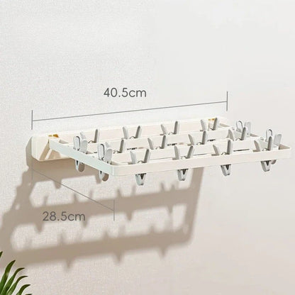 Étendoir à linge Mural pliant avec pinces intégré Blanc (16 pinces)