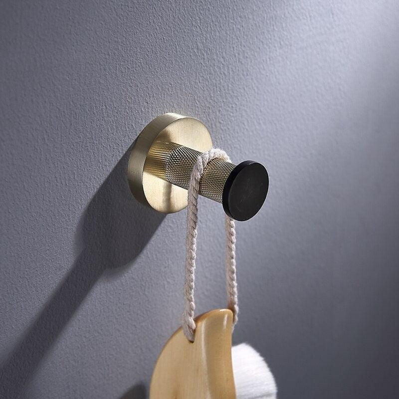 Accessoires de salle de bain or poli et noir mat