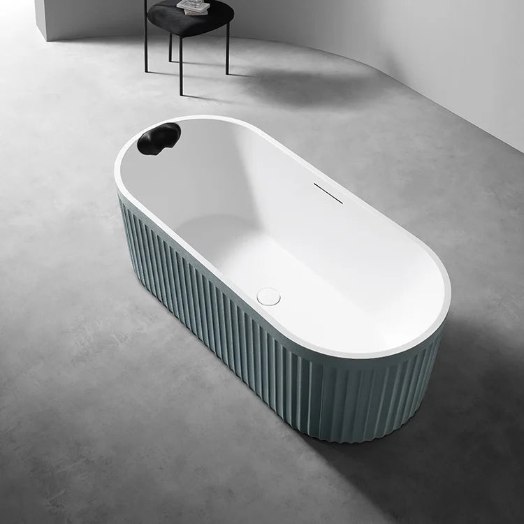 LIORA - Baignoire îlot cannelée en pierre artificielle