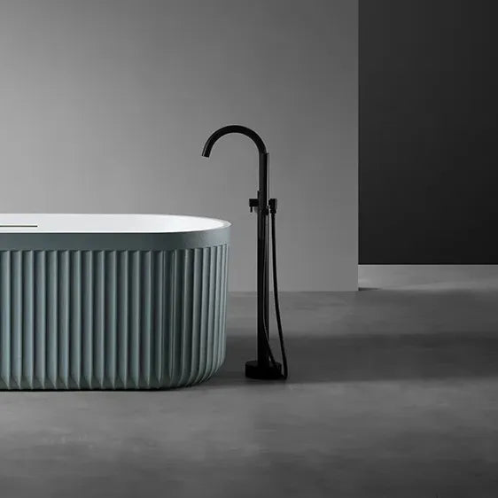 LIORA - Baignoire îlot cannelée en pierre artificielle
