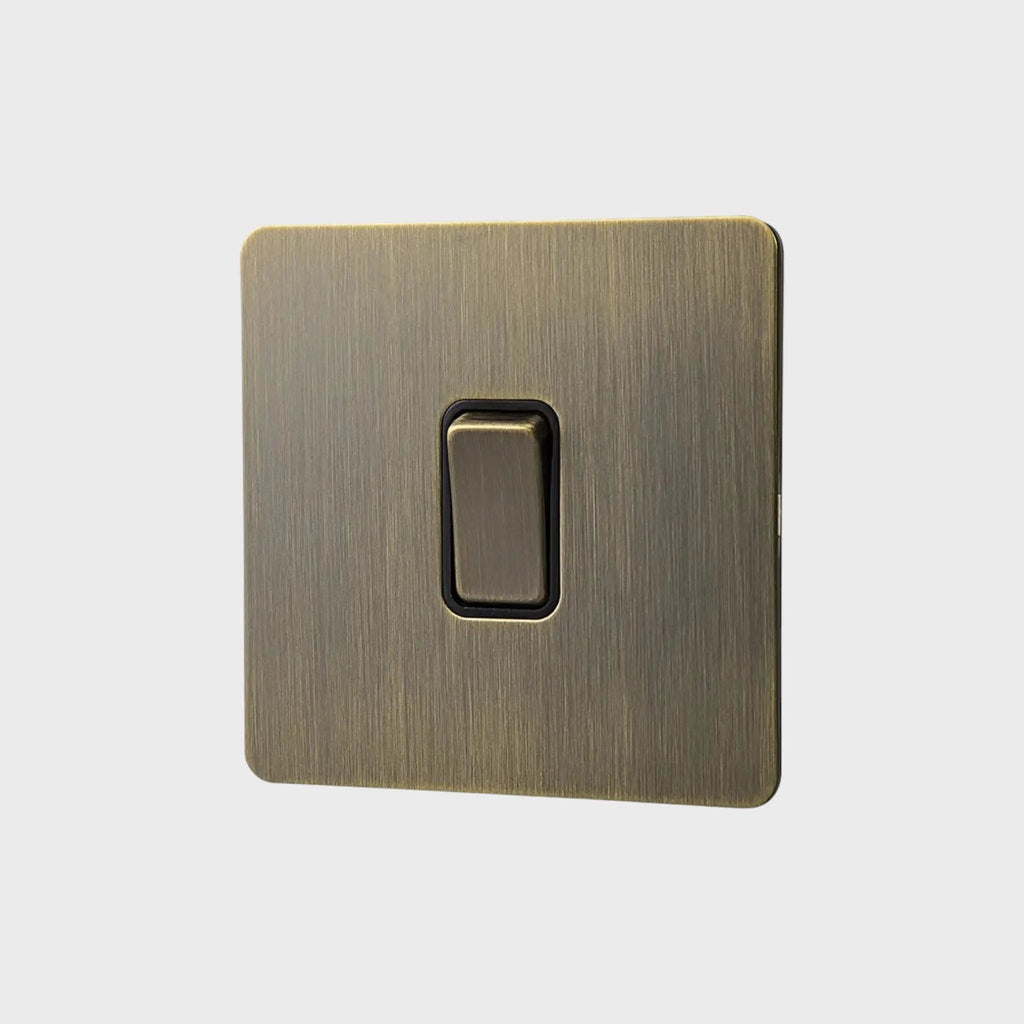 interrupteur bouton plat simple bronze brossé
