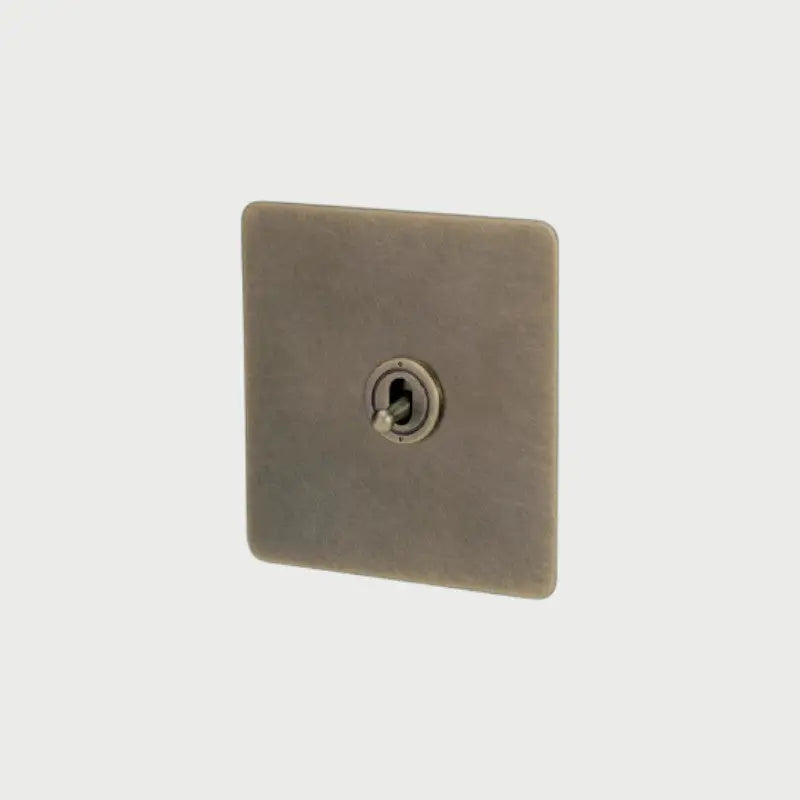 interrupteur va-et-vient simple bronze vieilli