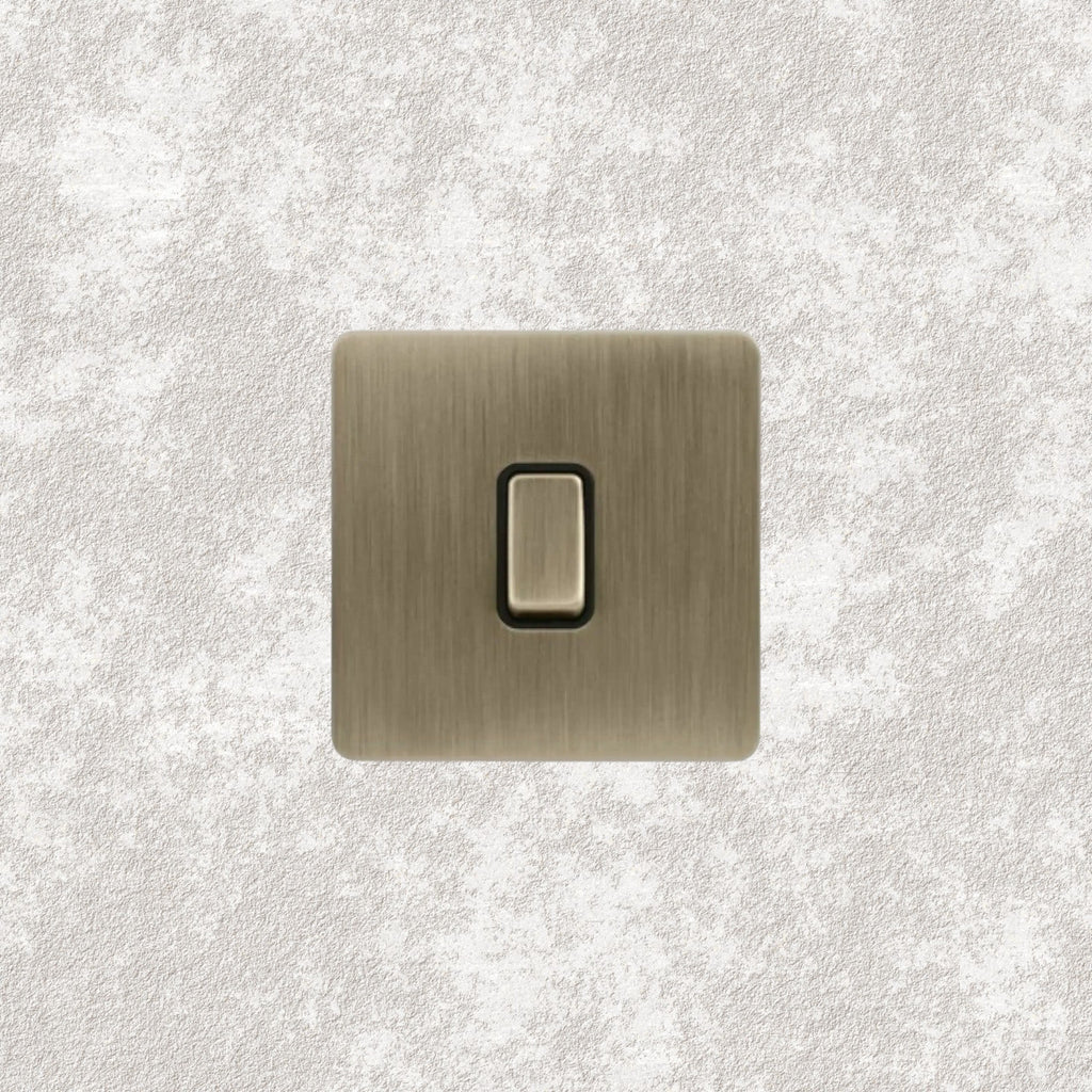 interrupteur bouton plat simple bronze brossé