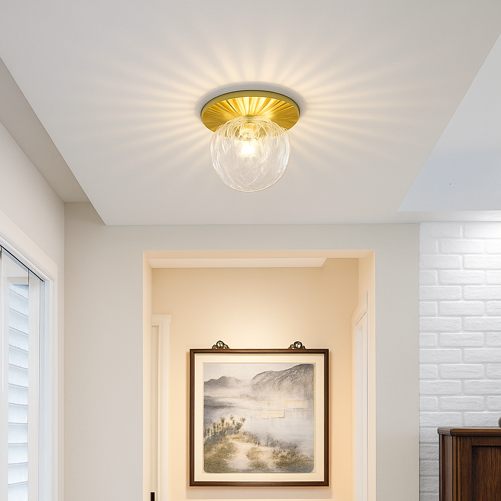 Plafonnier LED rond doré boule en verre AUREOLA