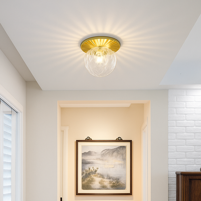 Plafonnier LED rond doré boule en verre AUREOLA