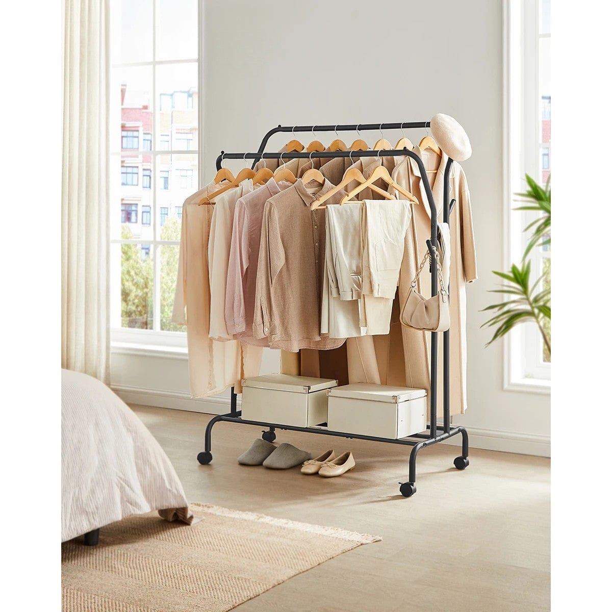 Portant double en métal noir avec roulettes – robuste et pratique