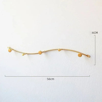 Porte-manteau mural design - Maintenez une entrée organisée avec style Or forme S