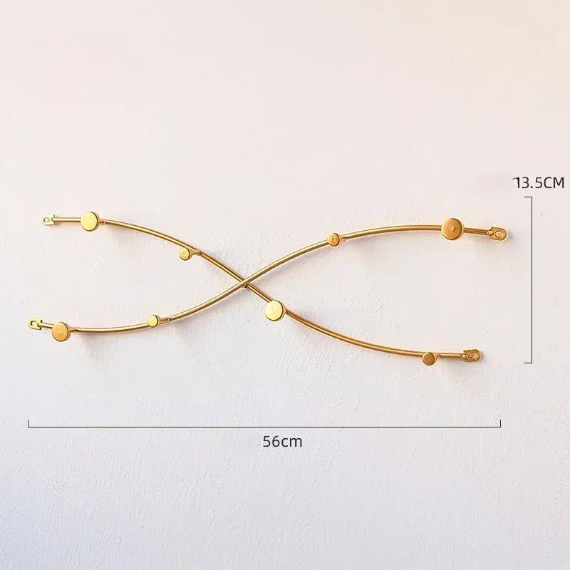 Porte-manteau mural design - Maintenez une entrée organisée avec style Or forme X